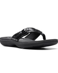 Women's Clarks Breeze Reyna Sandal in black with a sleek toe-post design, offering lightweight comfort and flexible support.