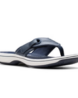 Women's Clarks Breeze Reyna Sandal in navy with white sole, featuring a lightweight design and flexible EVA footbed for all-day comfort.