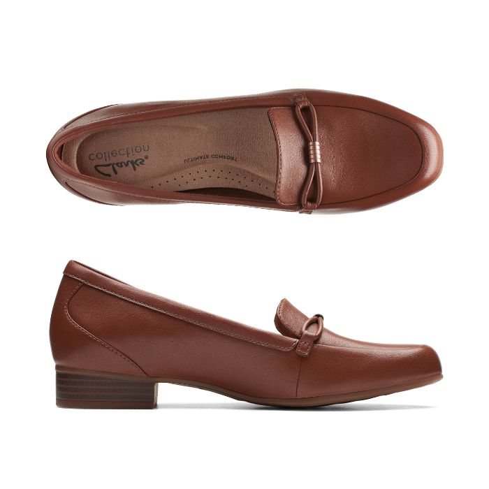 Black leather loafer with low heel and strap detailing on toe. Clarks logo on heel of brown insole.