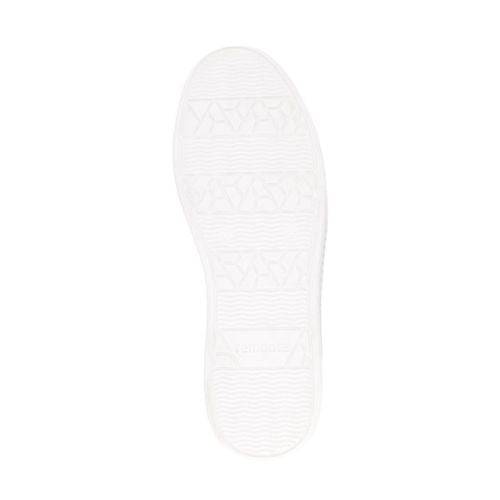 Bottom view of white Remonte D2E03 sneaker outsole, showing textured grip pattern for enhanced traction and comfort.
