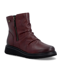 Deep burgundy ankle boot with side zippers, ruching and black treaded outsole.