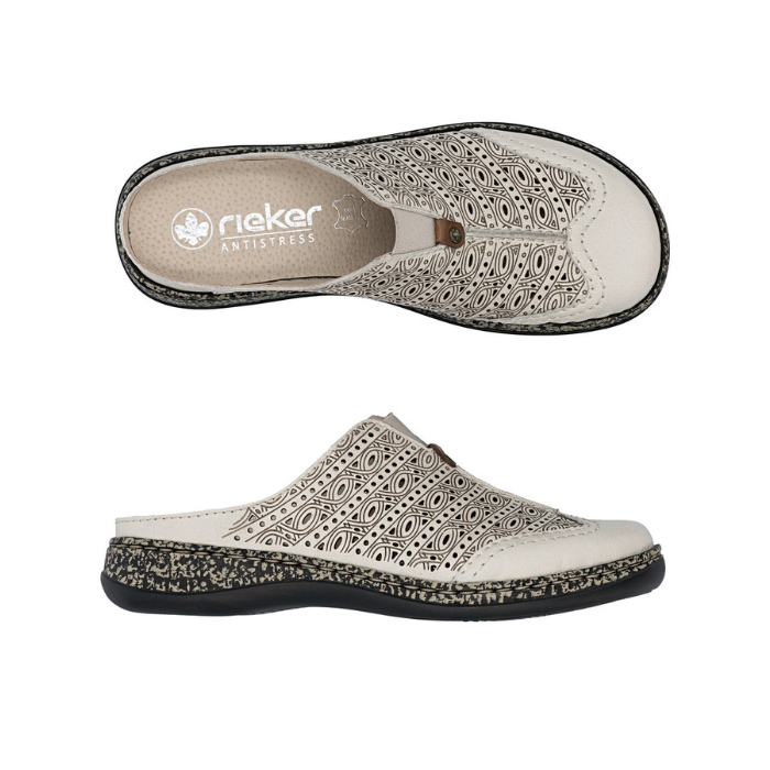 Pair of Beige  slip on clogs with perforations, brown design accents, tan Rieker logo'd footbed, tan/black marbles midsole and black outsole.