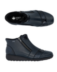 Pair of navy blue ankle boots with a zipper, patent and croco accents, black Rieker logo'd footbed and black outsole.