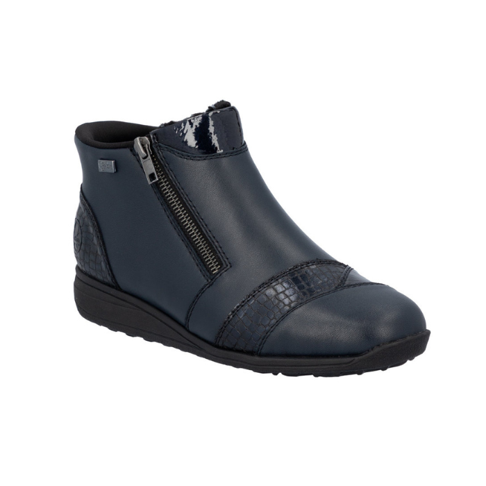 Navy blue ankle boot with a zipper, patent and croco accents and black outsole.