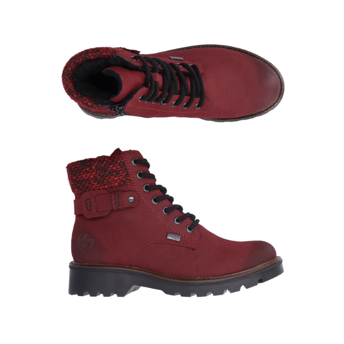 Pair of red combat boots with black laces, knit cuff, and rugged black outsole.