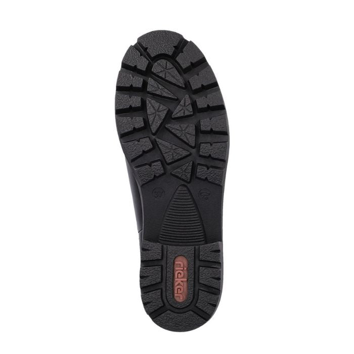Black rubber boot outsole with traction and red Rieker logo on heel. 