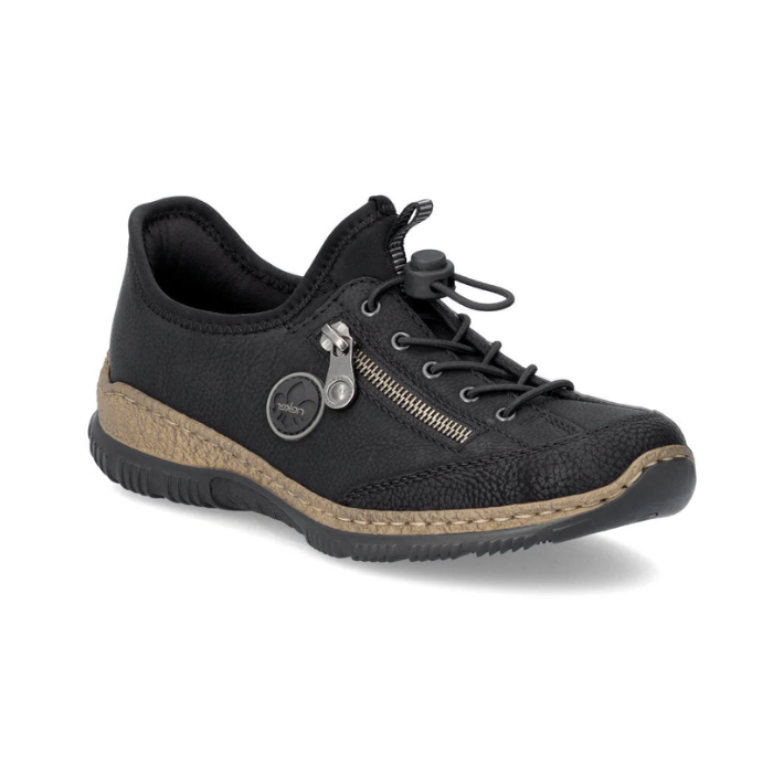 Black slip-on shoe with bungee laces, faux side zipper, Rieker logo in circle side emblem, brown faux cork midsole and a black outsole.