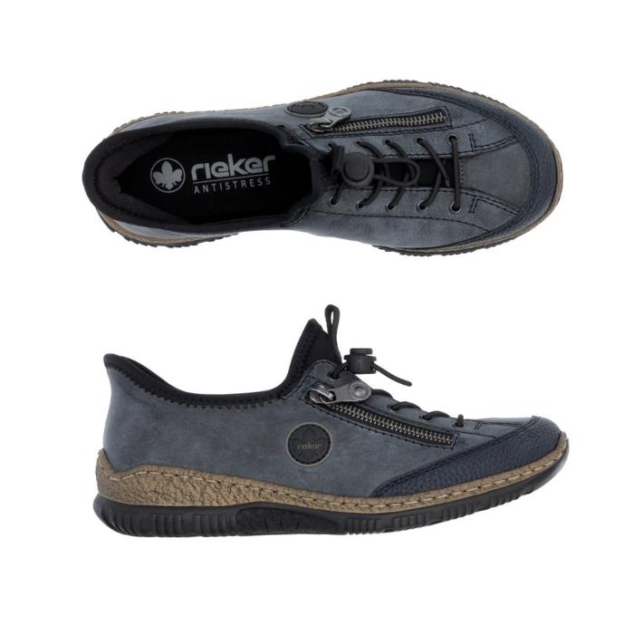 Pair of Blue slip-on shoe with bungee laces, faux side zipper, Rieker logo in circle side emblem, brown faux cork midsole and a black outsole.