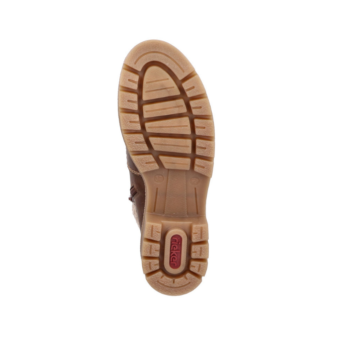 Tan deep treaded outsole of winter boot with red Rieker logo on heel.