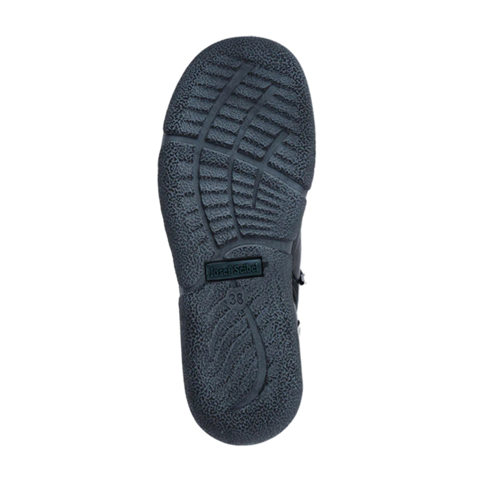 Light treaded outsole of a Josef Seibel ankle boot with logo stamped in middle.