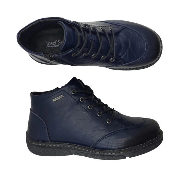 Pair of A dark navy blue leather lace-up ankle boots with inside zippers,  burnishing details, grey Josef Seibel logo'd footbed and a black outsole.