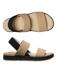 Pair of beige elastic strap sandals with black backstrap and black outsole.