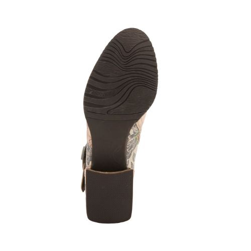 Brown light wave treaded outsole of ankle boot.