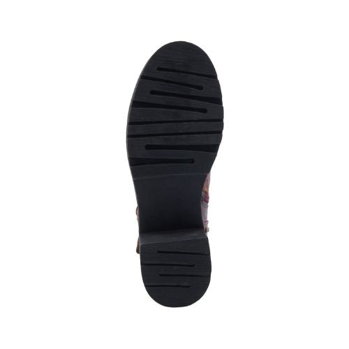 Black rubber outsole of combat boot with light tread.