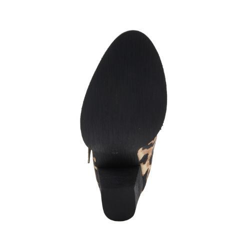 Black light treaded outsole with block heel.