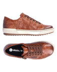 Pair of A brown leather lace-up sneakers with a zipper on the side, black Remonte logo'd footbed, an off-white midsole and brown outsoles.