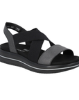 A black and gray platform sandal with crisscross elastic straps, a wide textured band over toe and black outsole.