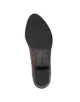 Light treaded black rubber outsole of ankle boot with low block heel and Remonte logo stamped in middle.