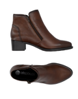 Pair of Brown ankle boots with side zipper, light burnished leather, Remonte logo'd footbed and low block heel.
