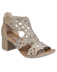 Beige sandal with caged design covered in rhinestones, closed back, open toe, tan Rieker logo'd footbed and block heel.
