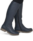 Dark navy blue knee-high riding boots with side zippers and rugged brown lugged outsole.