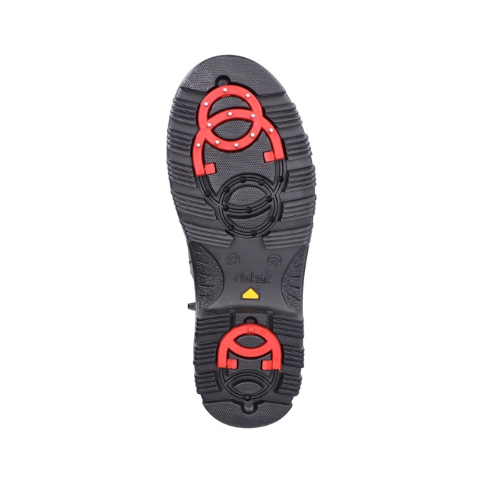 Black treaded outsole with red collapsible cleats on heel and toe area with Rieker logo stamped in middle.