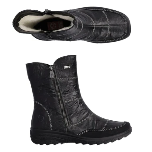 Pair of Black leather boots with dual zippers, detailed grey stitching, wool lining and treaded outsole.