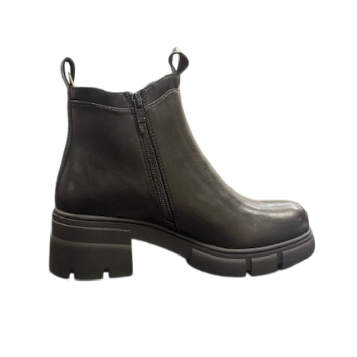 Profile of Black low heeled Chelsea boot with pull tabs and side zipper.