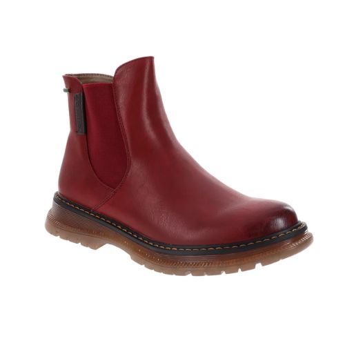 A red Chelsea boot with side goring elastic panel accent tan stitching and a lugged outsole.