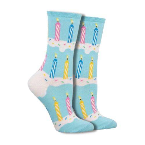Women&#39;s candle socks with a fun, colorful design featuring birthday candles on a light blue background. Perfect gift idea for holidays or celebrations.