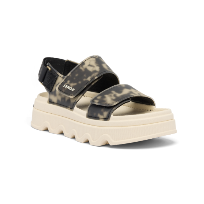 Ankle strap Sandal with camouflage straps and  thick white lugged outsole.