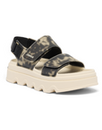 Ankle strap Sandal with camouflage straps and  thick white lugged outsole.