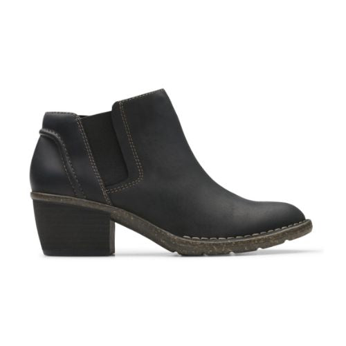 Low Block heel black ankle boot with side goring, detailed stitching and dark brown rocker shaped outsole.