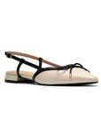 Pointed-toe slingback flat with black bow detail, cream upper and a low block heel.