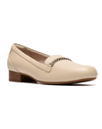 Beige loafer shoe with a gold chain detail and low stacked heel.