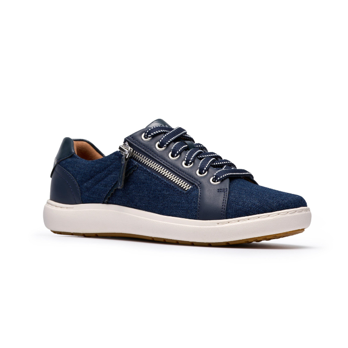 Denim sneaker with silver side zipper, navy laces,  white midsole and brown outsole.