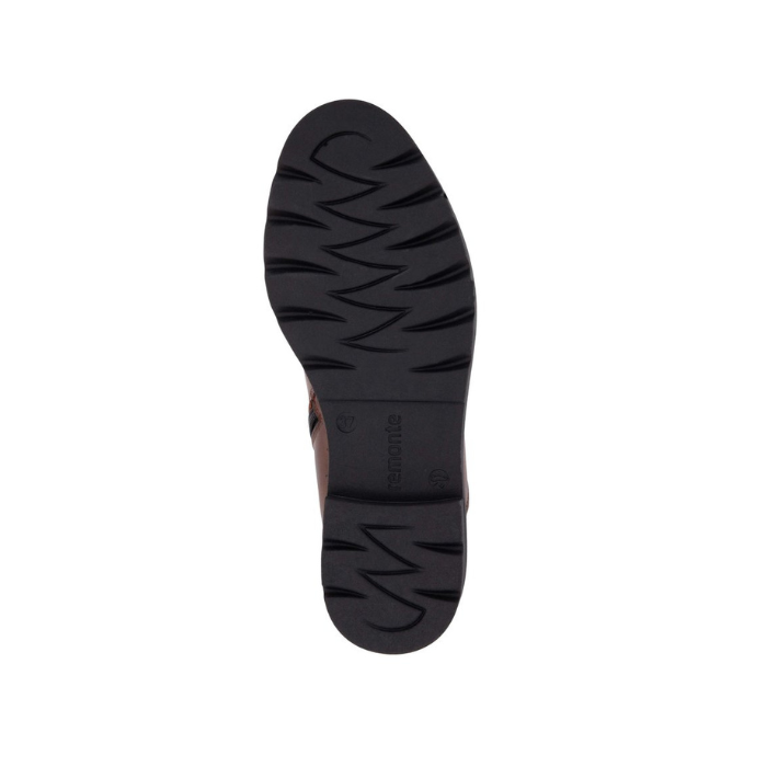 Black lugged rubber outsole of Remonte ankle boot.