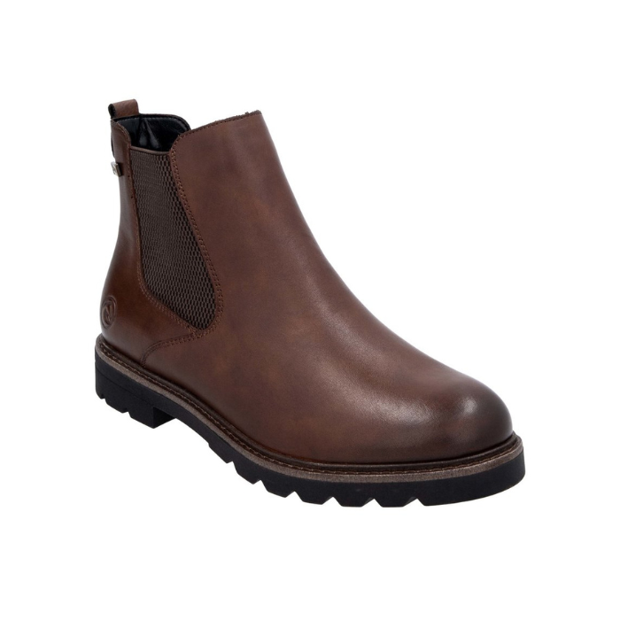 Brown Chelsea boot with side goring and lugged outsole. 