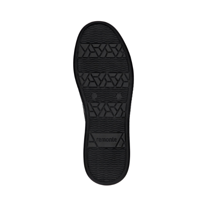 Black light treaded rubber outsole of sneaker with Remonte logo stamped in heel.