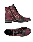 Pair of Red lace up ankle boots with bronze print pattern and accent sections, side buckle, thick black laces and low heel.