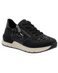 Black sneaker with plaid accents, beige midsole and black outsole.