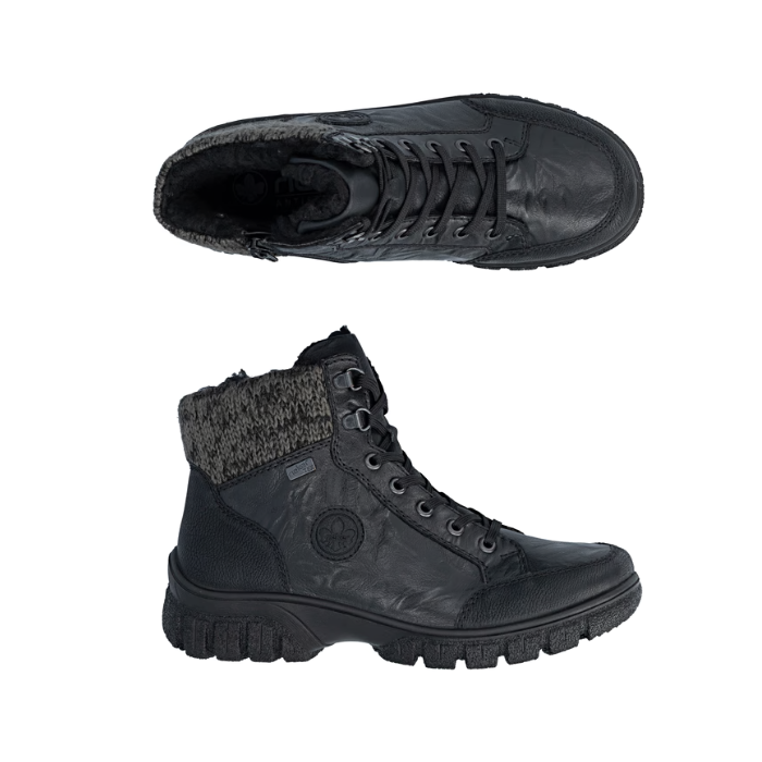 Pair Black hiking boots with knit cuff, black laces, silver eyelets and treaded outsole.