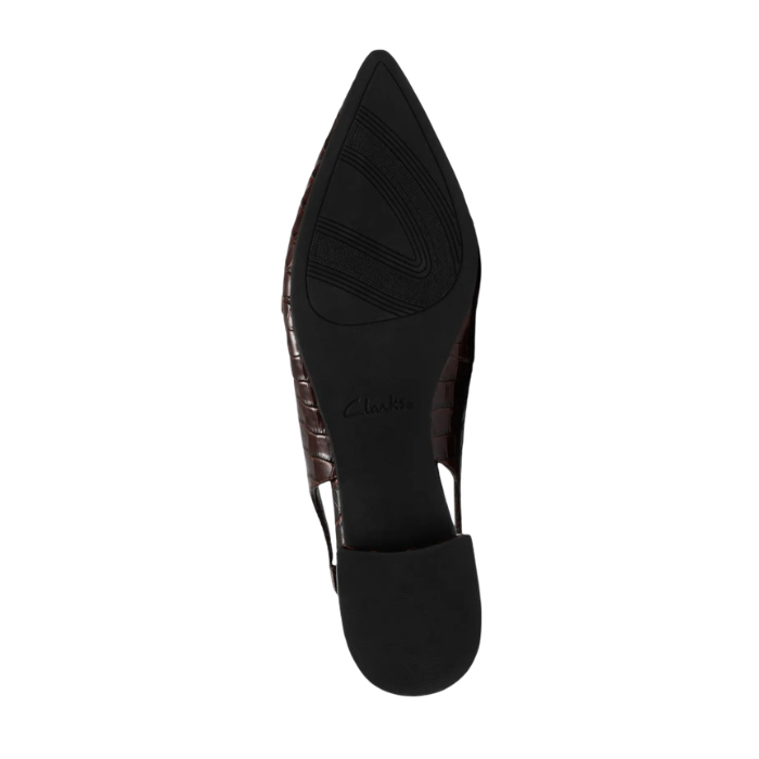 Black light treaded outsole with low heel of slingback pointed toe sandal