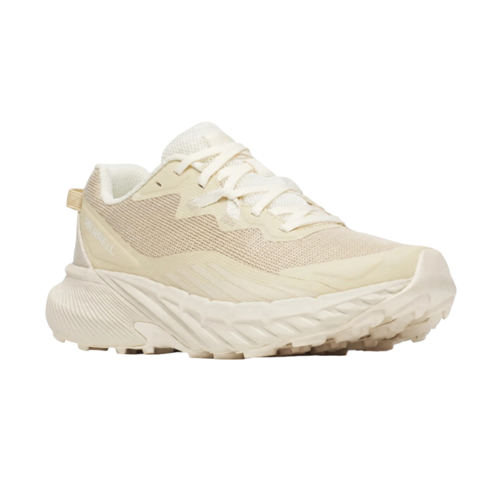 Beige sneaker with cushioned lugged outsole, light accents, and mesh upper.