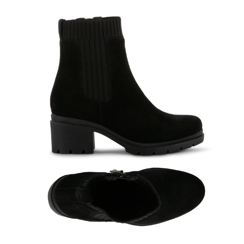 Pair of Black suede ankle boots with knit accent panels, inside zipper and low lugged block heel.