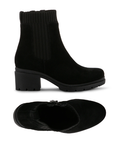 Pair of Black suede ankle boots with knit accent panels, inside zipper and low lugged block heel.
