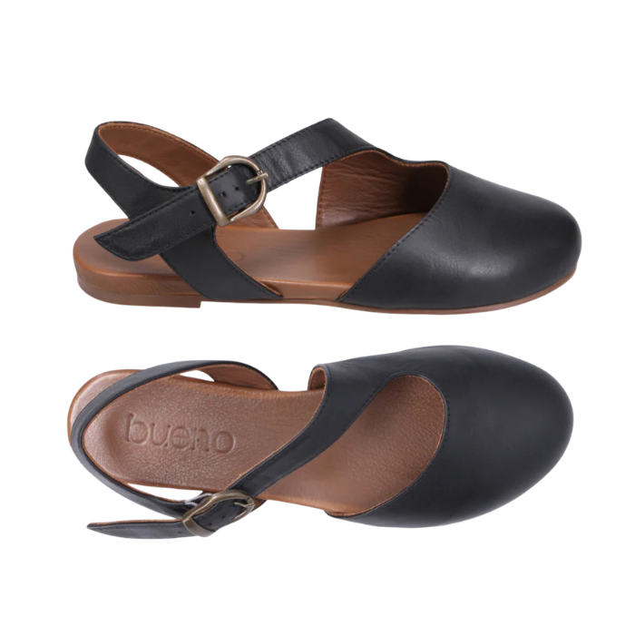 Pair of Black slingback D'orsay sandals with buckle closure, asymmetrical straps and tan Bueno logo'd footbed.