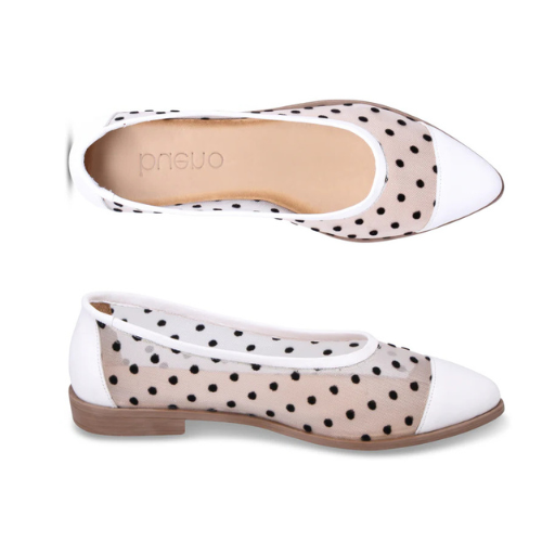 Pair of white with black Polka dot flat shoe with white cap toe and heel, tan Bueno logo'd footbed, mesh upper and beige outsole.