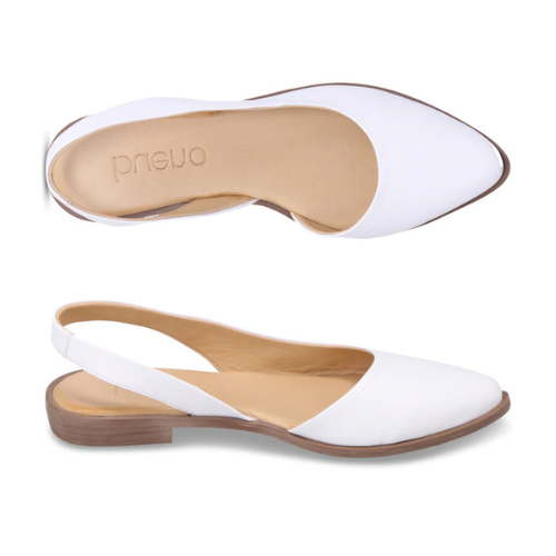 White shoes with brown soles on a white background