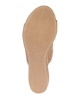 Tan light treaded outsole of slide sandal with size "37" stamped on side.